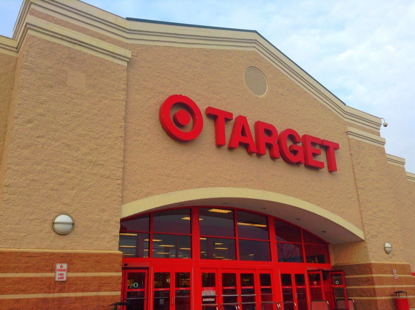 Target store front in the USA, the logo is red on a stone brick.